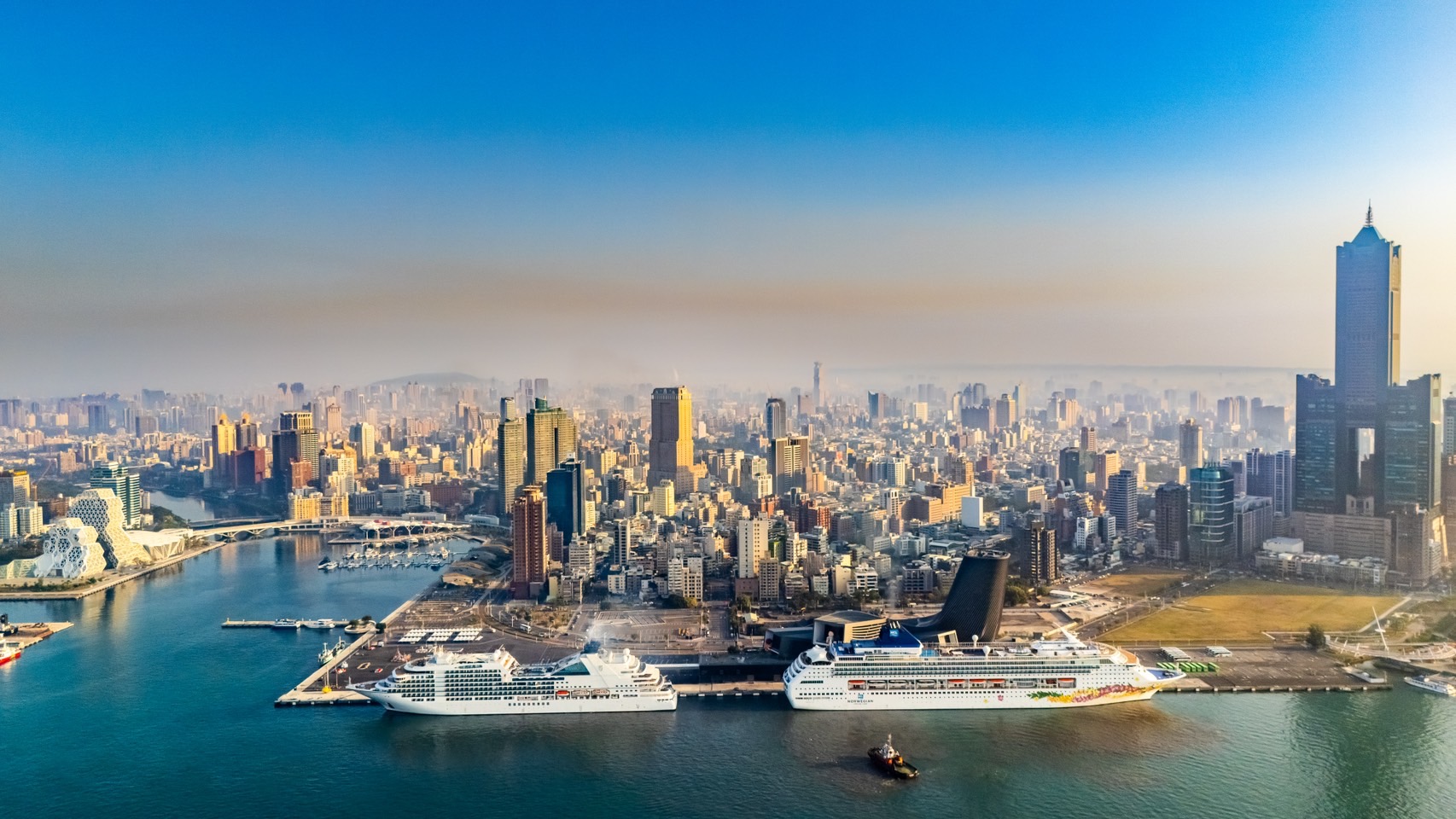Seabourn Encore (left) and Norwegian Sky (right) berthed at the Kaohsiung Port Cruise Terminal