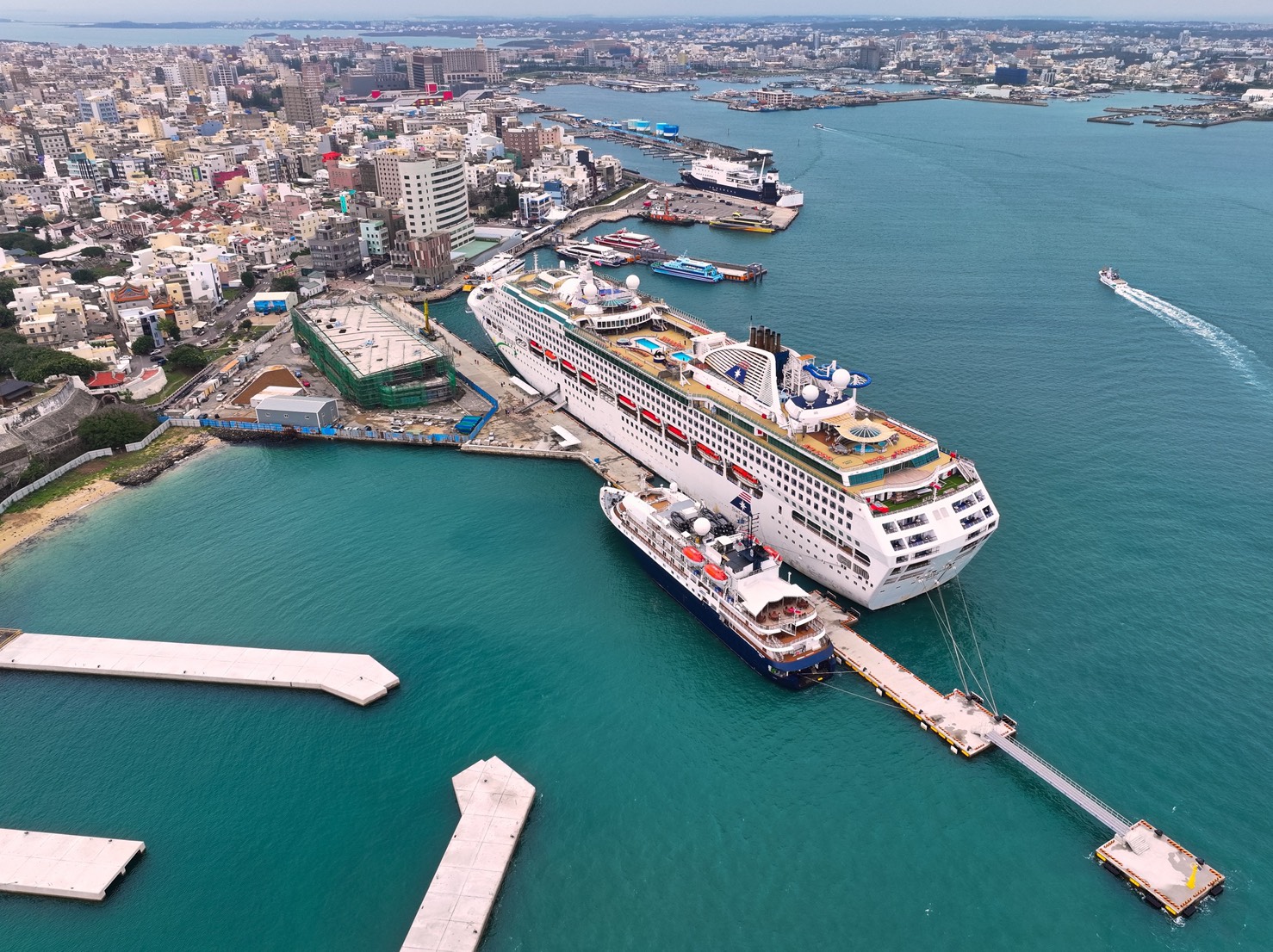Two cruise ships berthed side by side at Penghu Port